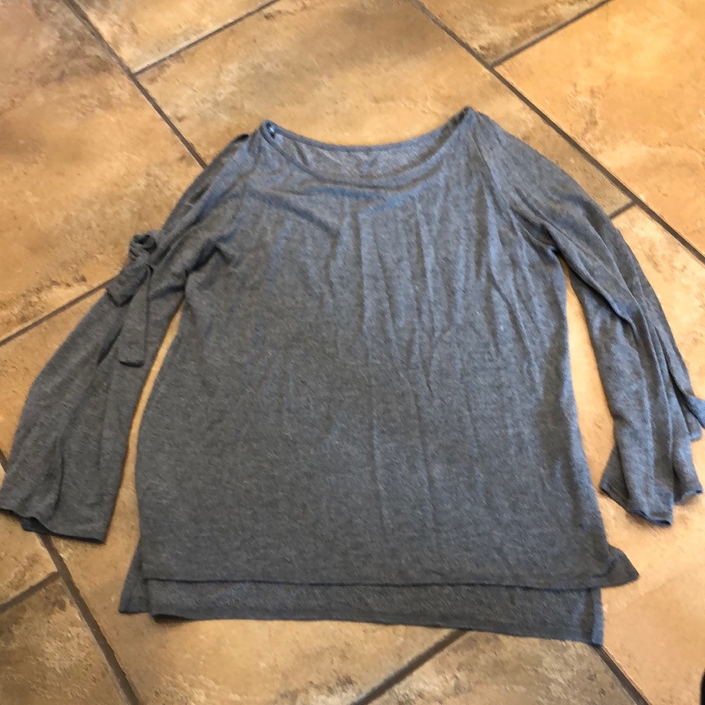 Cold shoulder top with flare arms and bows